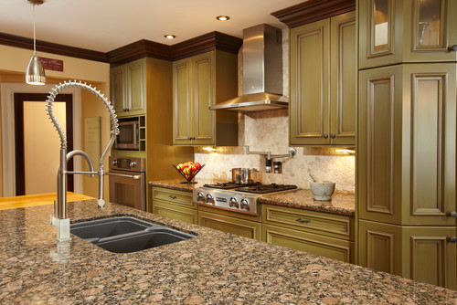 Antique Glazed Green Paint Maple Cabinets with Baltic Brown Countertop and Island Top and Tumbled Limestone Backsplash